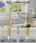 Slick Brushed Gold Kitchen Faucet With Pull Down Sprayer And Dual Spray Modes High Arc Spout Design in use with 18 inch hose.