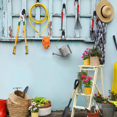 Outdoor wall with Six Pack Heavy Duty Garage Hooks 2.8 Inch U Shaped Wall Mounted Hanger organizing garden tools and hose