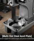 Close-up of multi-slot steel anvil plate on Heavy Duty Manual Arbor Press 3 Ton Desktop Punch Machine for secure metalworking.