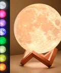 3D Moon Night Light For Kids Bedroom With Color Changing LED Globe Night Light on wooden stand showing color options