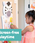 Child playing with Zebra Activity Wall Panel For Toddlers Ages 18 Months Plus Montessori Sensory Toy with nesting shapes