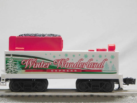 Winter Wonderland LionChief Steam Locomotive Engine for O Gauge with red and white design on track.