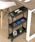 Space Saving Slim Storage Cart With 3 Tier Rolling Utility Smart Organizer Fits Tight Spots In Narrow Gaps In Bathroom Kitchen Laundry Or Office Black, placed next to a desk holding office supplies.