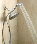 Refresh 9 Inch Rain Shower Head With 7 Function Handheld Sprayer in chrome, mounted on shower wall delivering water spray
