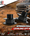 Drop In Ready Heavy Duty Two Inch Front Leveling Kit With Strut Spacers And Shock Extenders Compatible With Ford F250 And F350 Super Duty Four Wheel Drive Trucks shown on a vehicle in a rugged environment.
