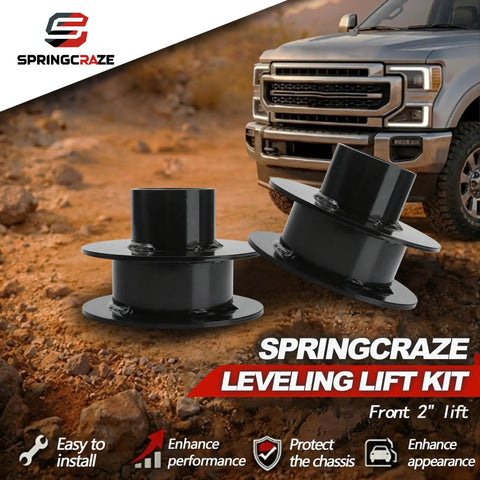 Drop In Ready Heavy Duty Two Inch Front Leveling Kit With Strut Spacers And Shock Extenders Compatible With Ford F250 And F350 Super Duty Four Wheel Drive Trucks shown on a vehicle in a rugged environment.