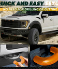 Image of Tow Hook Cover Kit For Ford F150 And Bronco Models 2004-2026 With Tremor Orange Silicone Rubber Upgrade For Beefed Up Front End Styling And Quick Easy Install, showing orange cover in use and on a Ford truck.