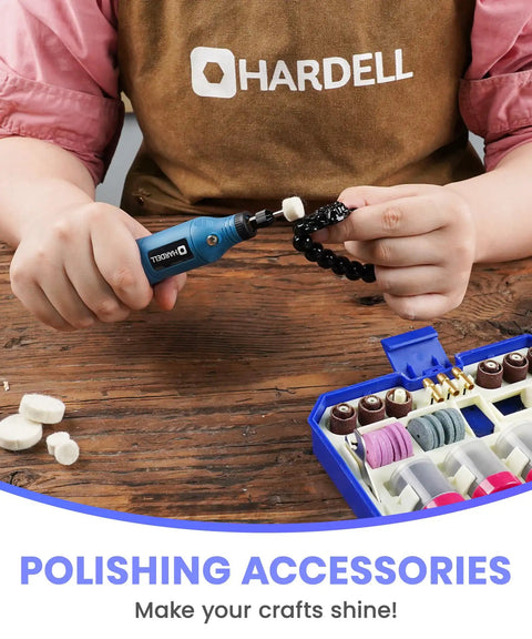 Close-up of a hand using a rotary tool with polishing accessories from the 287 Piece Rotary Tool Accessory Kit With One Eighth Inch Shank Bits.