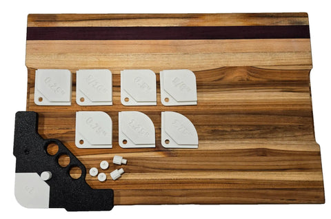 Professional Router Template And Corner Jig For Fine Trim Work features six interchangeable chamfer inserts on a wooden base.