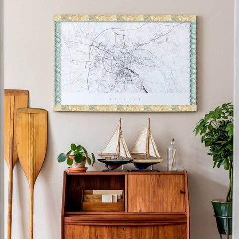 Travel The Map Bulletin Board Border With Globes For Classroom And Home Office Decor on a wooden wall above model ships