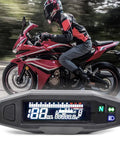 Universal Ride Ready Motorcycle Digital Speedometer With 6 Gear RPM Gauge shown with motorcycle in motion.