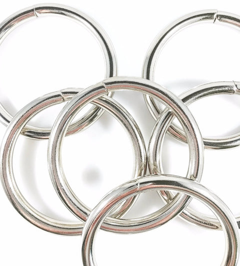 Overhead close-up of nickel-plated steel O-rings, 2.5 in ID, 12-pack