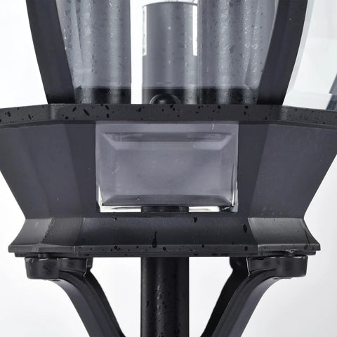 Close-up of textured black base and clear beveled glass of Three Light Outdoor Post Lantern In Textured Black With Clear Beveled Glass