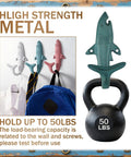 Kick It Up A Notch With These Six Piece Cast Iron Shark Tail Wall Hooks For Hanging Hats Keys Bags And Jackets, featuring three hooks.