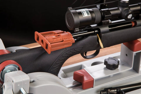 Rapid Deluxe Bore Guide Kit with four muzzle guides on rifle for easy gun cleaning, precise cleaning rod alignment
