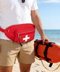 Man on beach wearing Rugged First Aid Fanny Pack With MOLLE System Lifeguard Emergency Medical Waist Bag For Hiking Camping