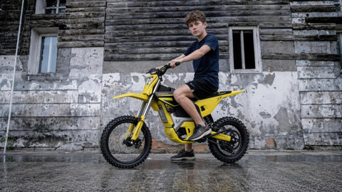 Heavy Duty Electric Dirt Bike Two Pack Crafted For Teens And Adults Packing 5500W motors, rider on yellow dirt bike.