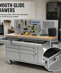 Heavy Duty Rolling Tool Chest With Ball Bearing Slides And Rock Solid Steel Workbench Storage Rack showing smooth glide drawers, tools, and wood surface.