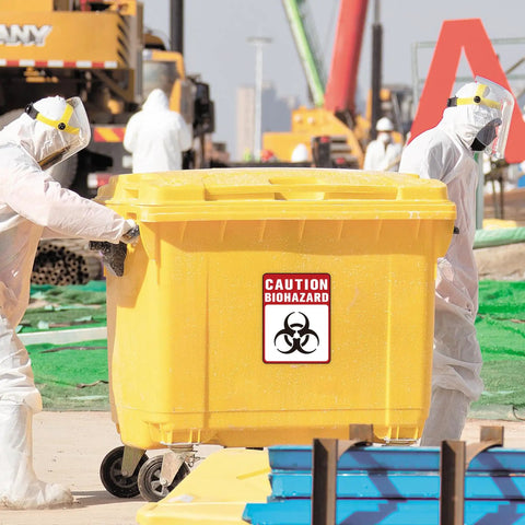 Heavy Duty Self Adhesive Biohazard Warning Decals Waterproof Toxic Waste Stickers on yellow biohazard waste container in use.