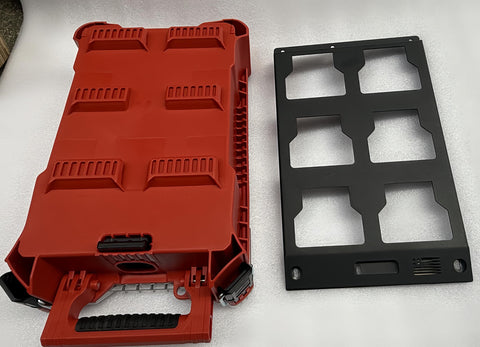 Packout Mounting Plate for Milwaukee System next to red toolbox, heavy duty metal base, pre drilled holes, two half plate design, black