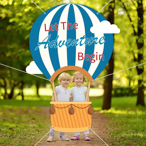 Children posing with Epic 78 Inch Hot Air Balloon Photo Booth Frame Travel Theme Selfie Prop in a park