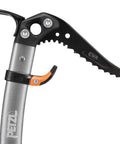 Close-up of ice axe with Adjustable Hand Rest Trigrest For Ice Axes And Mountaineering Comfort Grip, showing ergonomic handle.