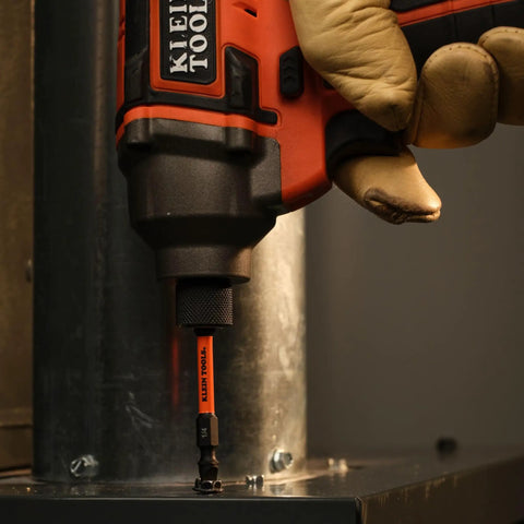 15-In-1 Multi-Bit Ratcheting Screwdriver Set With Impact-Rated Bits in use, shown with gloved hand in industrial setting