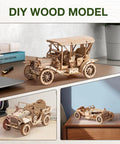 Three assembled DIY wood models of vintage cars on a desk and shelf, showcasing intricate design and detailing for crafting projects.
