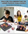 Kids playing Laser Maze STEM Logic Toy For Kids Ages 8 To 13, 60 Plus Challenges Puzzle Games with parents, showcasing teamwork.
