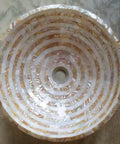 Slick White And Golden Mother Of Pearl Vessel Sink 24X24X5 Five Point Five Inches Handmade round basin with concentric patterns.