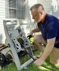 Man connecting a Heavy Duty Garden Hose With Female To Female Connectors, 6 Feet By 5/8 Inch Black Water Hose For Quick Attachments