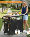 Woman using 43.3-Inch Outdoor Kitchen Island With Storage Cabinet And Stainless Steel Top All-In-One Solid Wood Prep Station