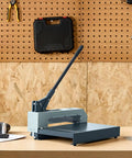 Heavy Duty Manual Plate Shear 12 Inch Guillotine Sheet Metal Cutter For Steel Aluminum Copper Plastic PCB Boards Precision hand tool on workshop table.