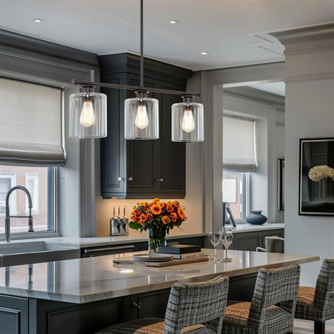 Dope Three Light Modern Industrial Farmhouse Kitchen Island Pendant Lighting With Clear Glass Cylinder Shades in kitchen
