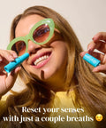 Woman holding Motion And Morning Sickness Nausea Relief Inhaler No Pills Needed Fast Acting Drug Free Pocket Sized 2 Inhalers