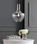 Oil Rubbed Bronze 13.25 Inch Mid Century Modern One Light LED Pendant Light Fixture With Clear Glass Shade over table