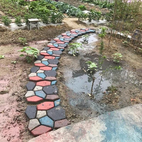 Installed large reusable concrete molds for paving walkways and stepping stones DIY friendly time saver durable polypropylene cement