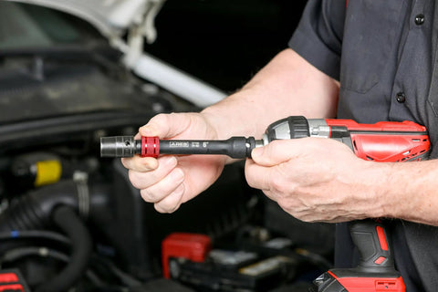 Mechanic using Nine Piece Extension Bar Set With Magnetic Organizer Includes Quarter Inch Drive Extensions in Two, Four, and Six Inches