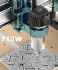 Close-up of Next Gen 4040 Pro Max CNC Router with 710W spindle, showing detailed engraving on metal, linear rail drive visible.