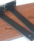 10 Inch Black Hidden L Shelf Brackets Set Of 12 Heavy Duty Iron Floating Shelf Brackets Rustic Industrial Style 5mm Thick Supports Up To 100 Lb Per Pair Matte Black Finish, shown on a wooden board.