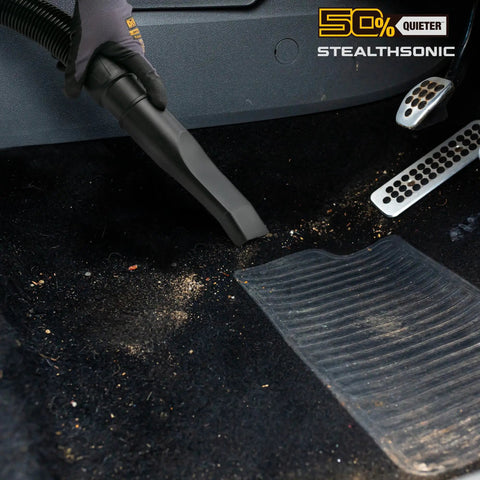 Heavy Duty 10 Gallon Wet Dry Shop Vacuum Featuring Straight Up Quiet Stealth Sonic Motor And Insane Suction Power For Garage Jobsite Workshop Cleanups Or Auto Detailing With All Attachments Included cleaning car floor with nozzle.