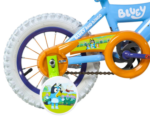 Close-up of Bluey Themed 12 Inch Girls BMX Bike With Coaster Brake, Steel Frame, Training Wheels, Colorful Decals And Bar Pad