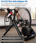 Cyclist using 12x142 Thru Axle Adapter for Wahoo KICKR SNAP Bike Trainer with Aluminum Alloy Construction, showing rear fork adapter.