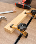 Extended 5-3/8 Inch T Slot Hold Down Clamps 4 Pack for CNC Router and Woodworking adjustable with rubber pads shown in use