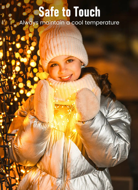 Child holding Twinkle Fairy Lights 33 Ft USB Plug In String Lights With Remote And Timer 100 LED Waterproof Wire glowing softly