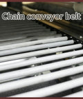 Close-up of the heavy duty chain conveyor belt of the 220V Industrial Heat Shrink Wrapping Machine Tunnel.