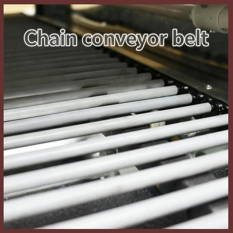 Close-up of the heavy duty chain conveyor belt of the 220V Industrial Heat Shrink Wrapping Machine Tunnel.