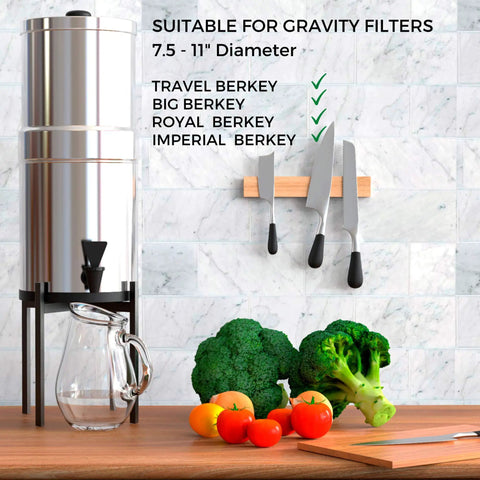 Adjustable Water Filter Stand With 10 Inch Lift displayed on countertop with pitcher, compatible with Berkey gravity dispensers.