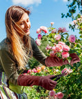 Woman using Thorn Proof Long Gardening Gloves For Women And Men Heavy Duty Pruning Gauntlets For Roses Blackberries Cactus And Holly