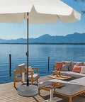 Beefy Heavy Duty Umbrella Base Tube For Outdoor Patio Umbrella Stand with white canopy on lakeside deck